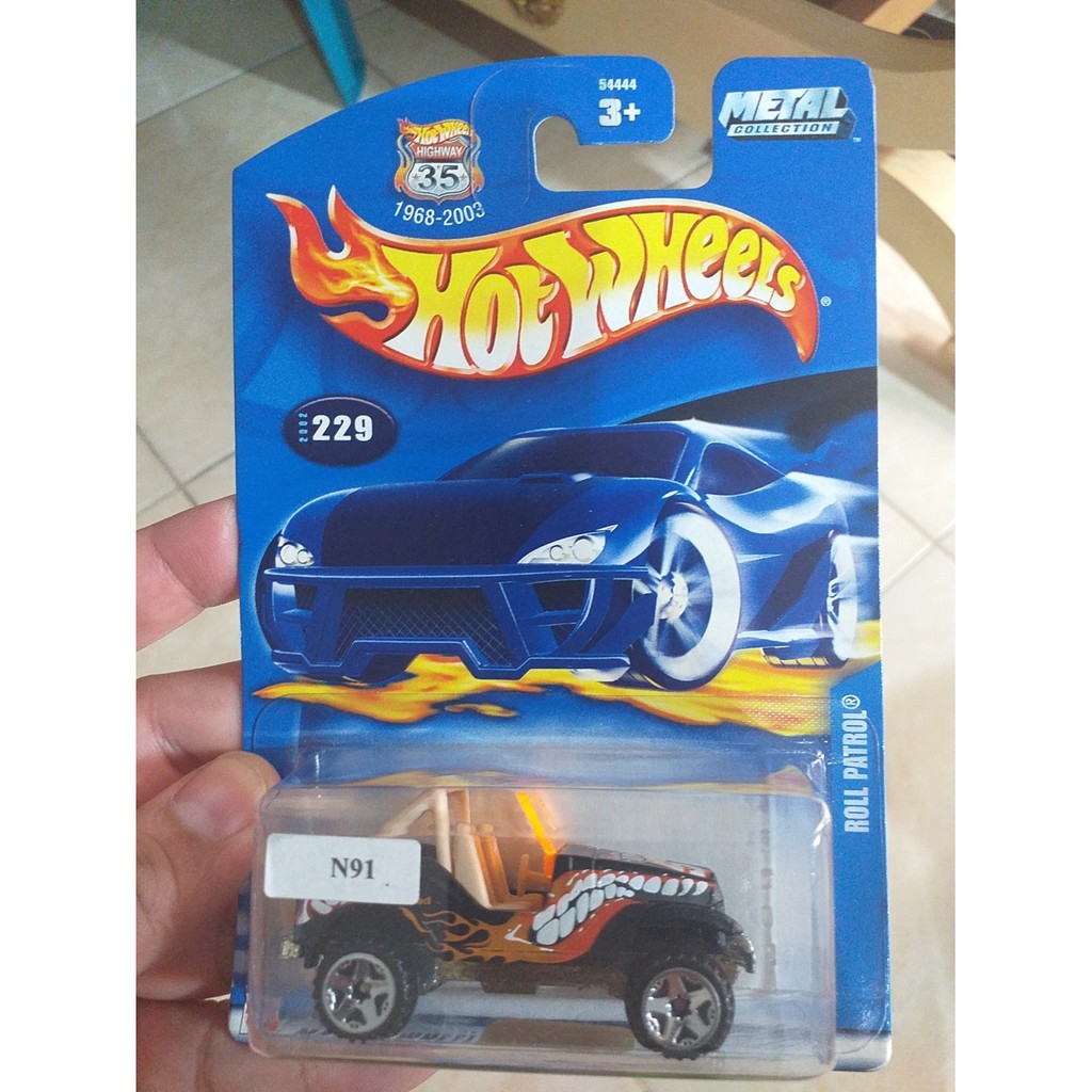 Jual HOT WHEELS ROLL PATROL HITAM Shopee Indonesia