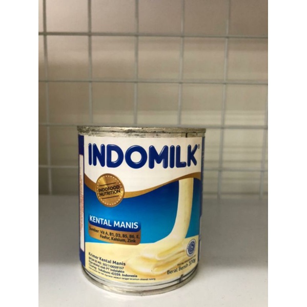 Jual INDOMILK SUSU KENTAL MANIS PUTIH KALENG 370G Shopee Indonesia