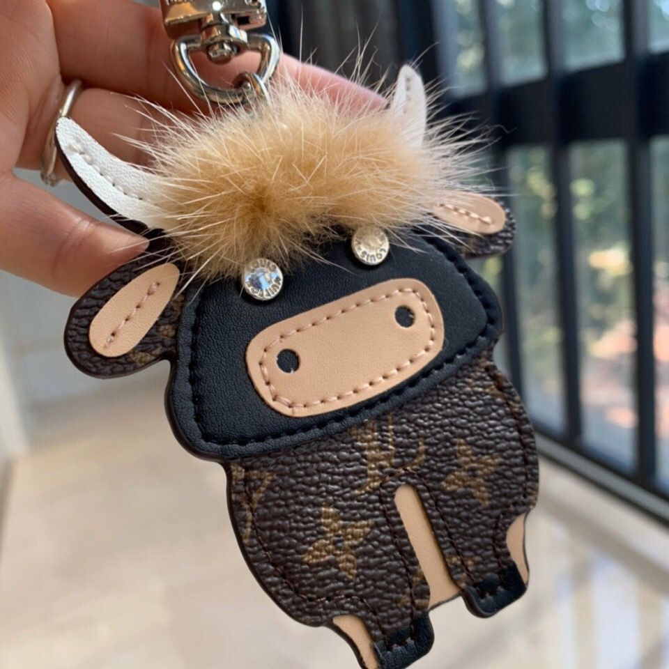 Jual Louis Vuitton Calf Keychain Cute Cow Pendant Cow Turn Qiankun Couple  Bicycle Key Chain Presbyopic Mi