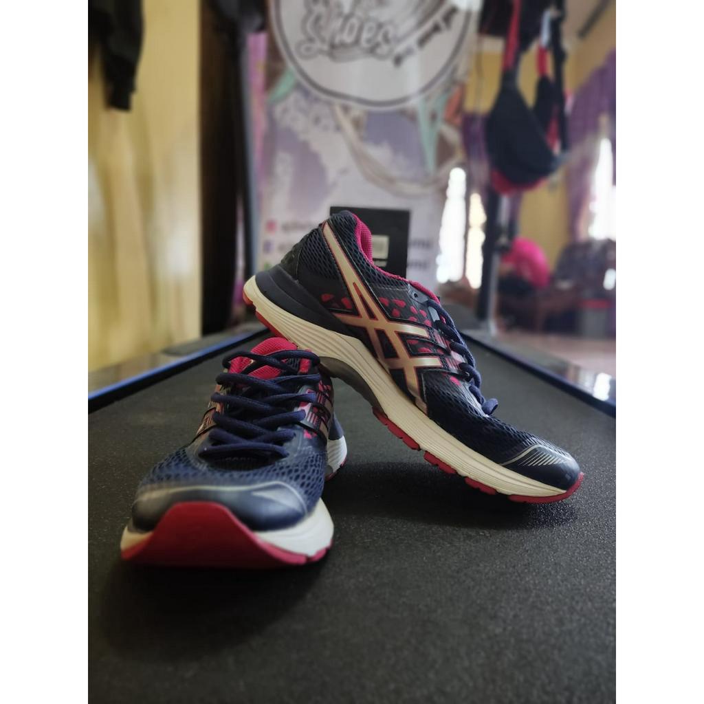 Sepatu asics hotsell pulse 9