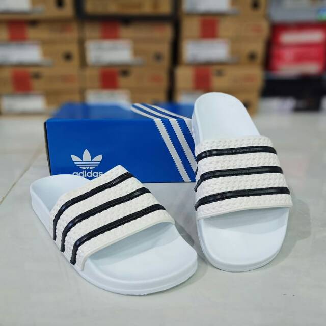 Sandal adidas putih adilette slop made in italy 40 44 putih