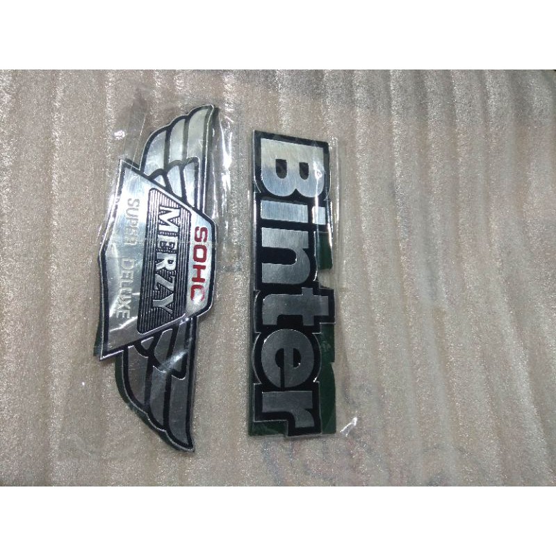 Jual logo emblem tangki emblem box dop aki kawasaki binter merzy cdi