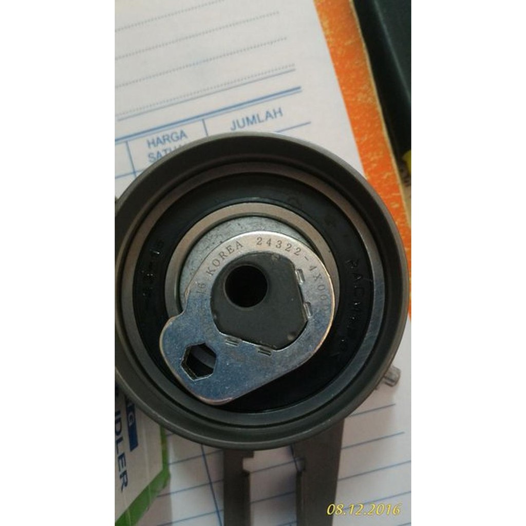 Jual Unik tensioner auto timing belt 0k88R kia carnival dan sedona