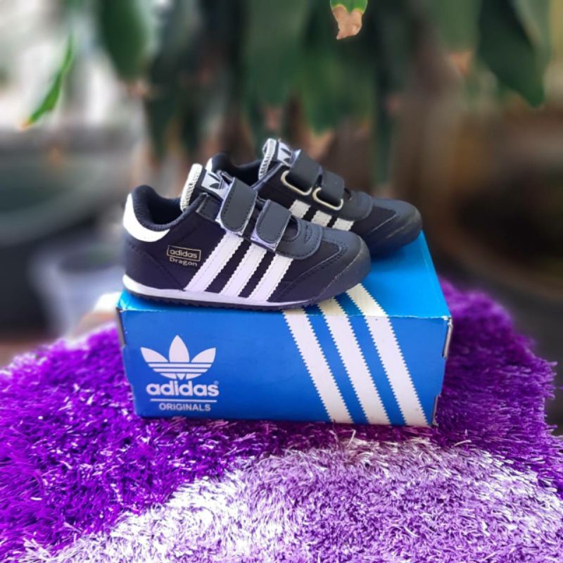 Adidas dragon ungu hotsell