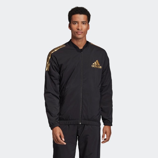 Adidas track top black sales gold