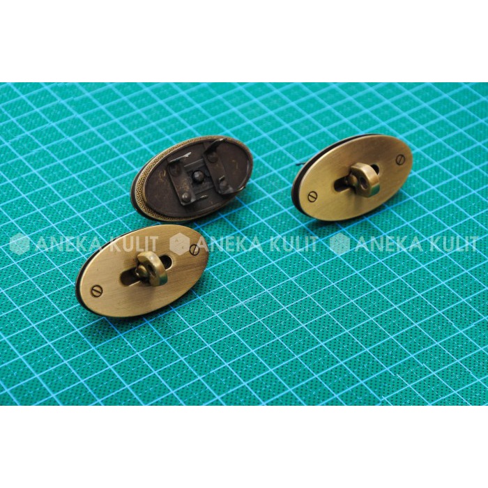 Jual PROMO Aksesoris Kunci Tas Model Putar Oval FS Kecil Agg (Ag Bakar ...