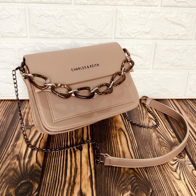 Harga tas charles and keith sling bag sale