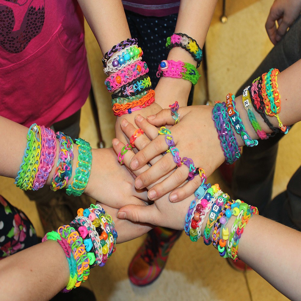 Rainbow loom rubber band bracelet hi-res stock photography and