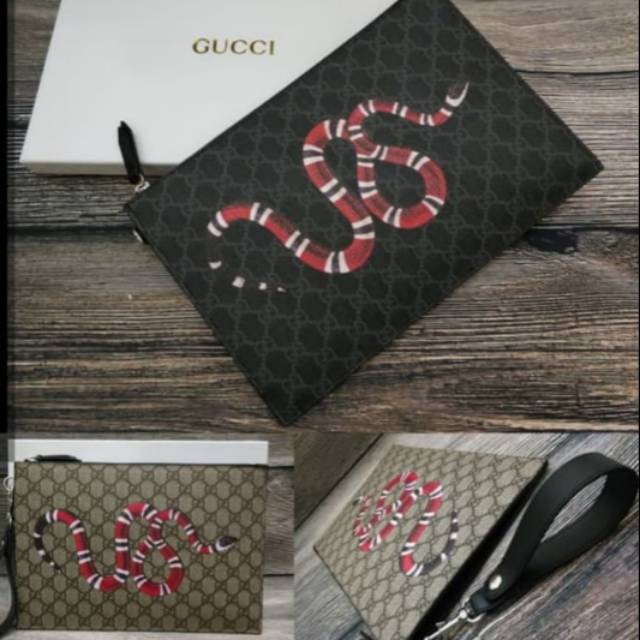 Gucci best sale clutch snake