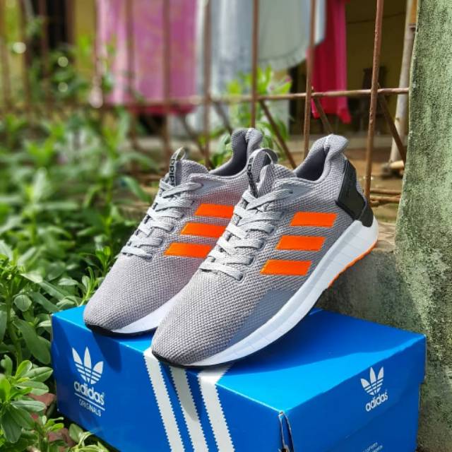 Jual Adidas questar ride grey orange Shopee Indonesia