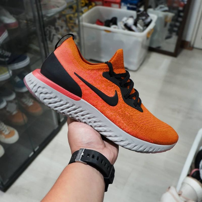 Nike epic react flyknit femme orange online