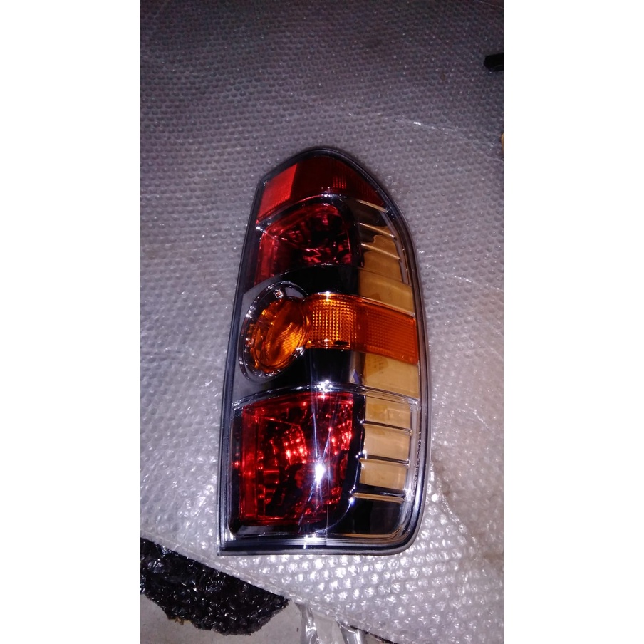 Jual LAMPU STOP KANAN RH MERK AUTOLAMP MAZDA BT50 | Shopee Indonesia