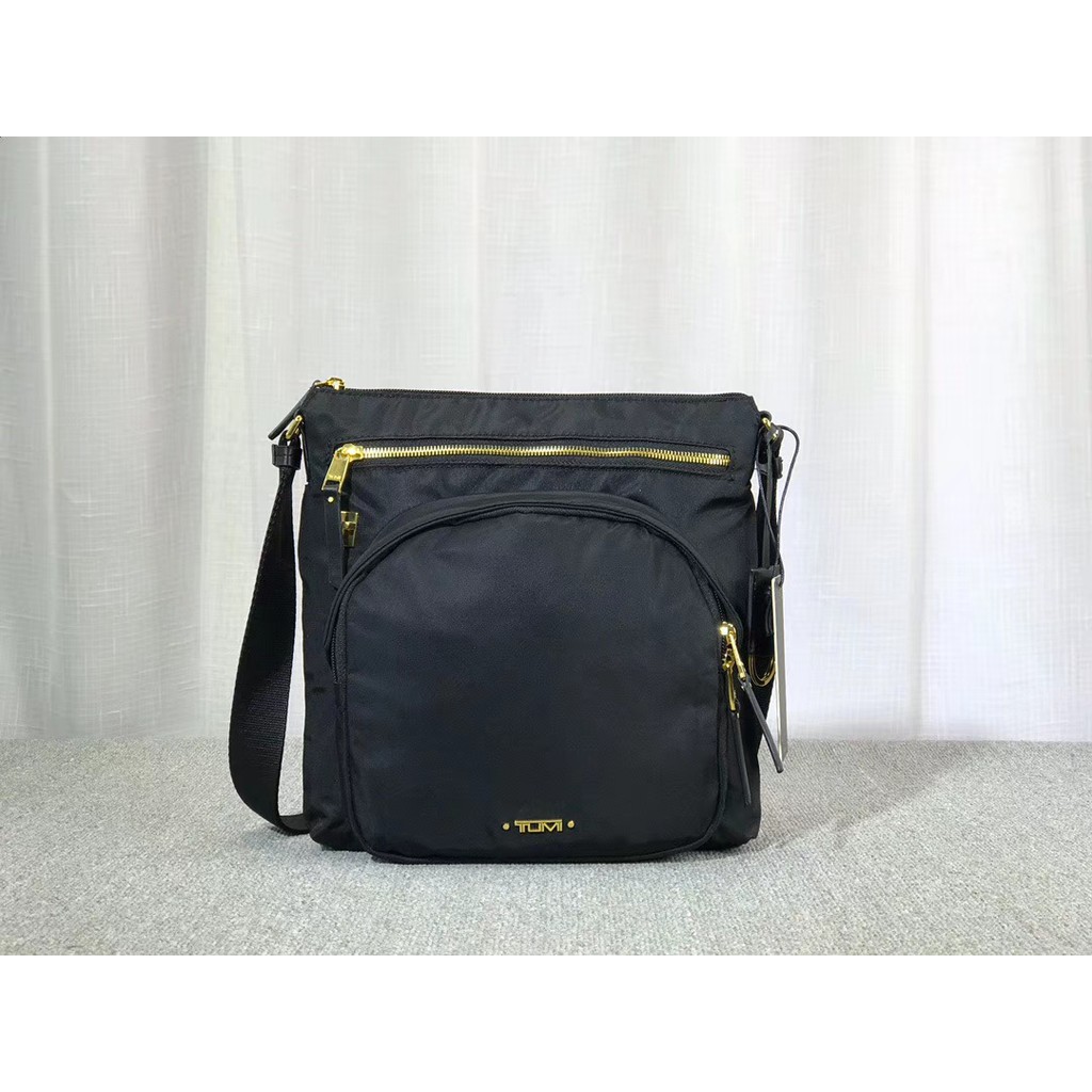 Tumi carmel crossbody outlet bag