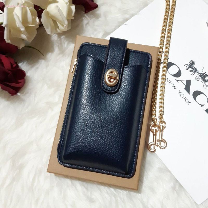 PROMO PHONE BAG 825 TURNLOCK PROMOAIN PHONE CROSSBODY IN BLOCKED SIGNATURE CANVAS