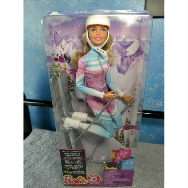 Barbie skier doll pink passport made to move online