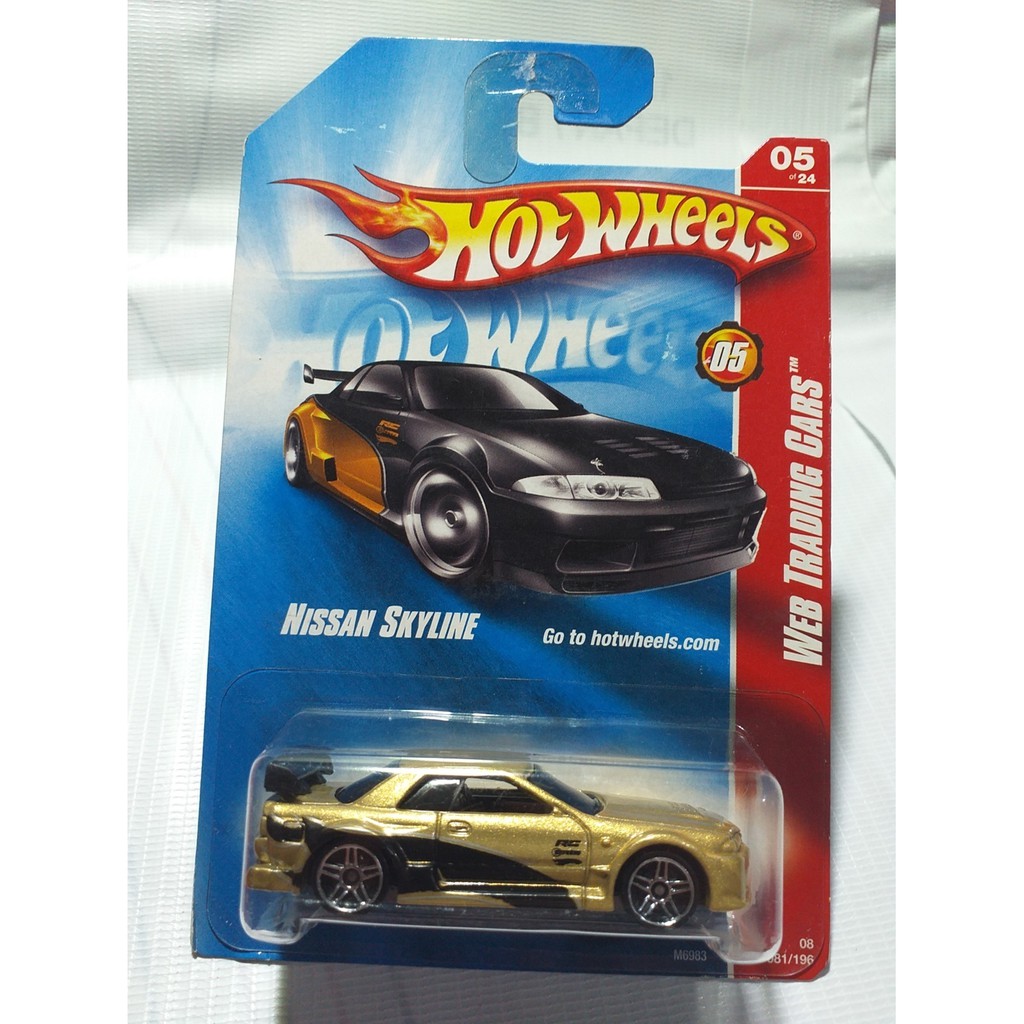 Jual HOT WHEELS NISSAN SKYLINE R32 WEB TRADING CAR GOLD HITAM | Shopee ...