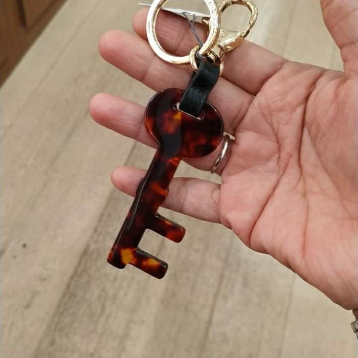 Fossil hot sale key charm