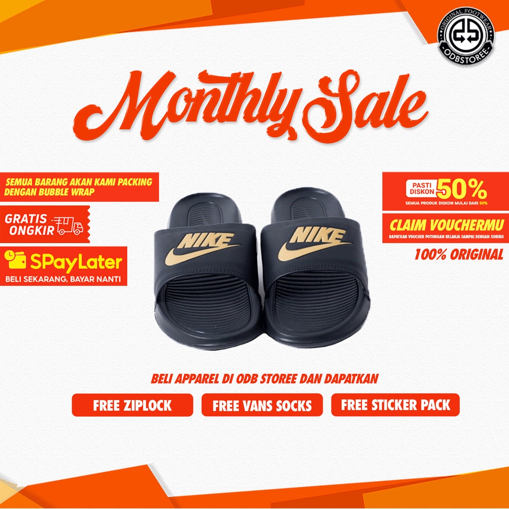black and gold nike sandals
