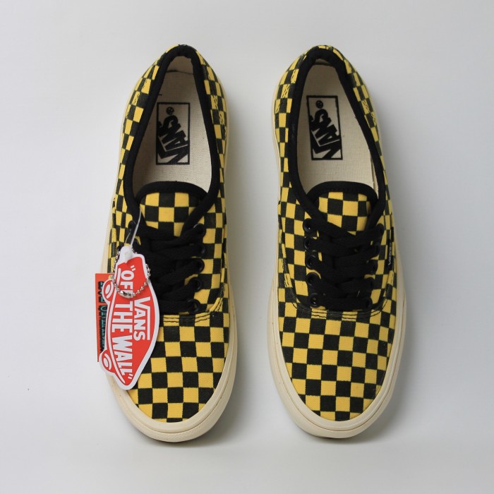 Vans checkerboard yellow on sale black