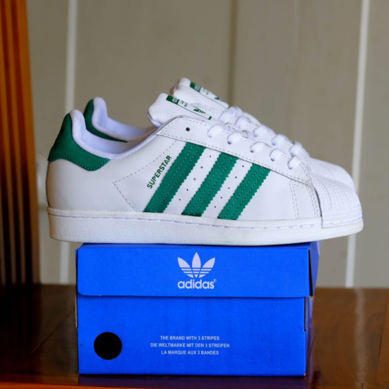 Adidas superstar lineas verdes best sale