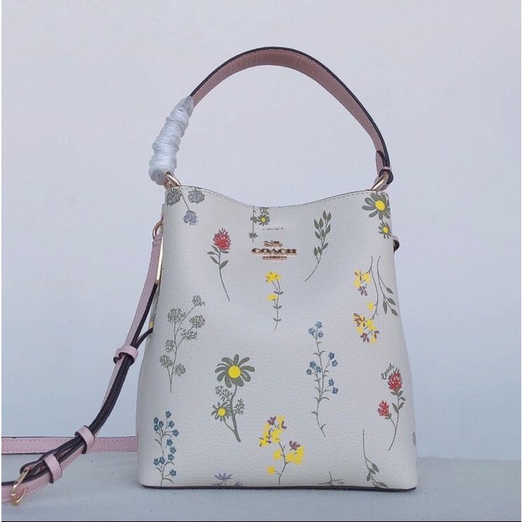 Coach small town bucket bag with dandelion floral print sale