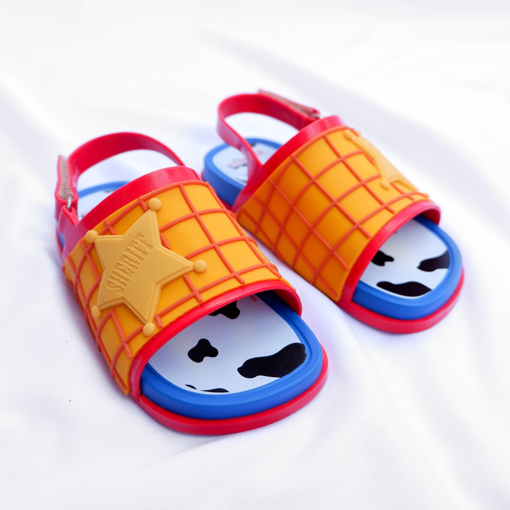 Mini Melissa Beach Slide Toy Story Woody Red Blue Yellow