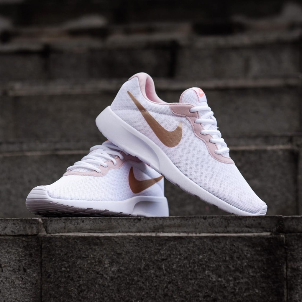 Nike tanjun hot sale white gold