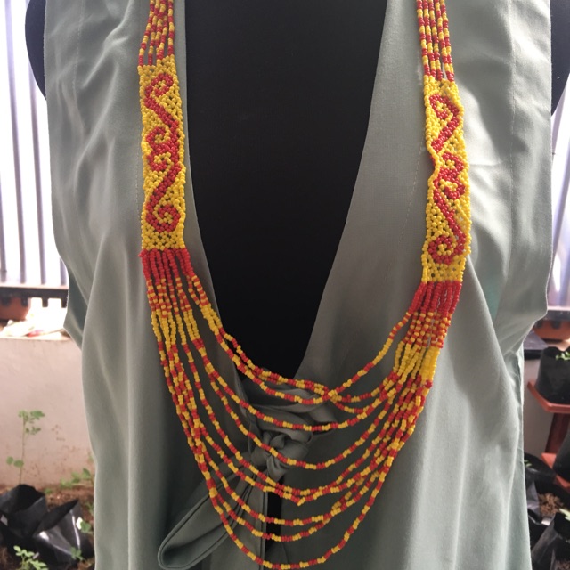 Jual Kalung Manik Etnik Dayak motif S warna kuning merah | Shopee Indonesia