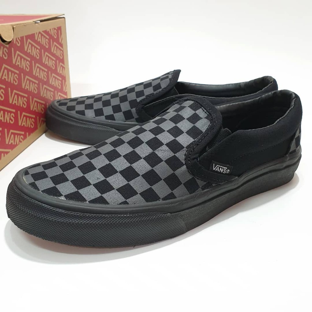 Checkerboard vans black hot sale and grey