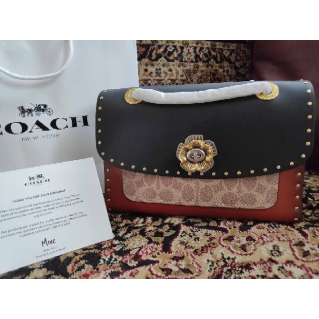 Harga coach parker deals