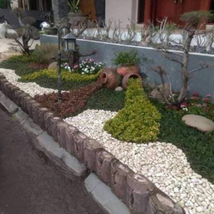Jual Taman batu koral/batu alam/tukang taman jual rumput swiss,jepang