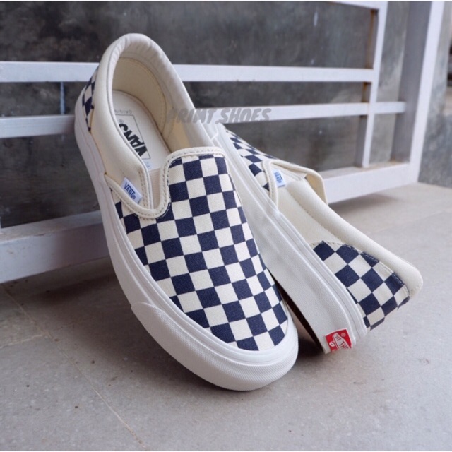 Harga vans slip deals on checkerboard original