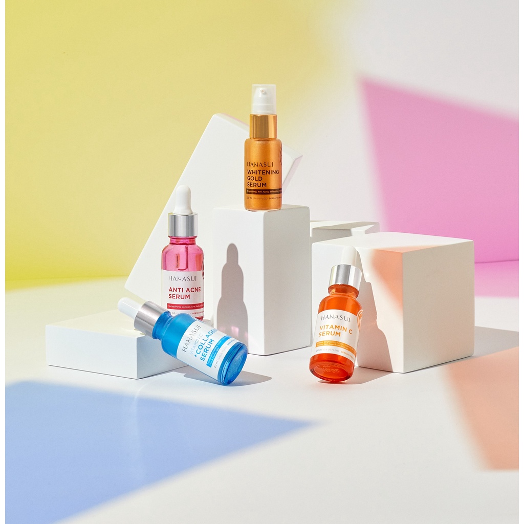 Serum Hanasui kemasan putih dengan label merah dan logo Hanasui