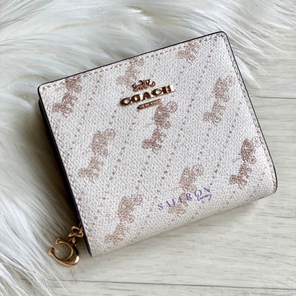 Coach wallet online cream