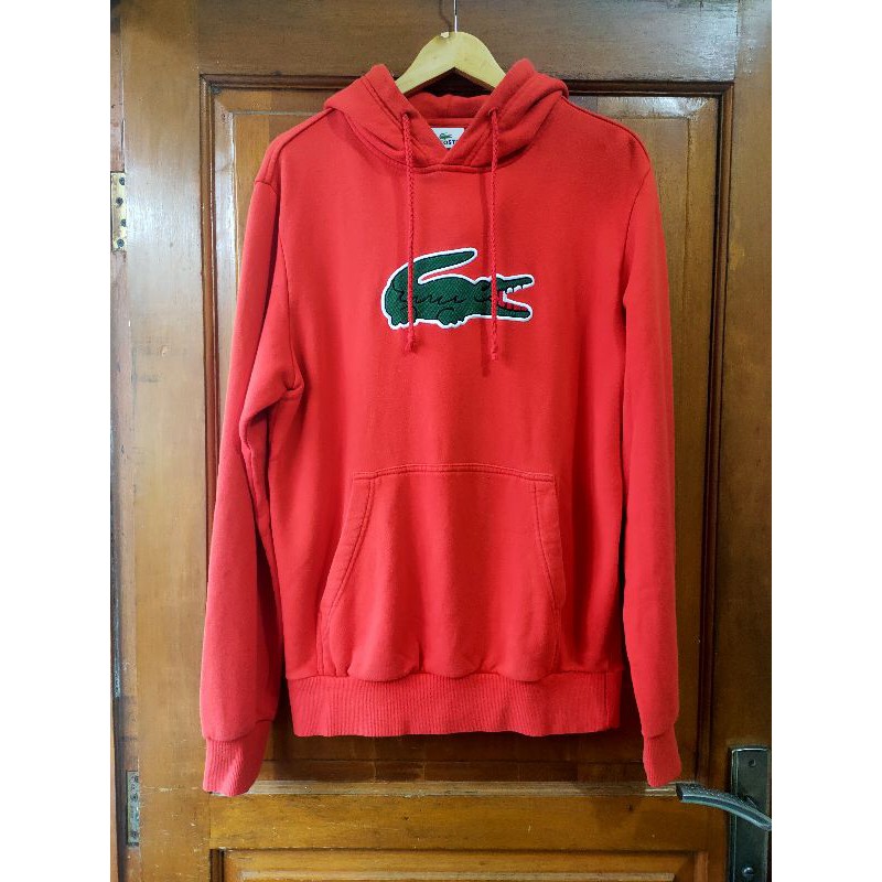 Orange hotsell lacoste hoodie