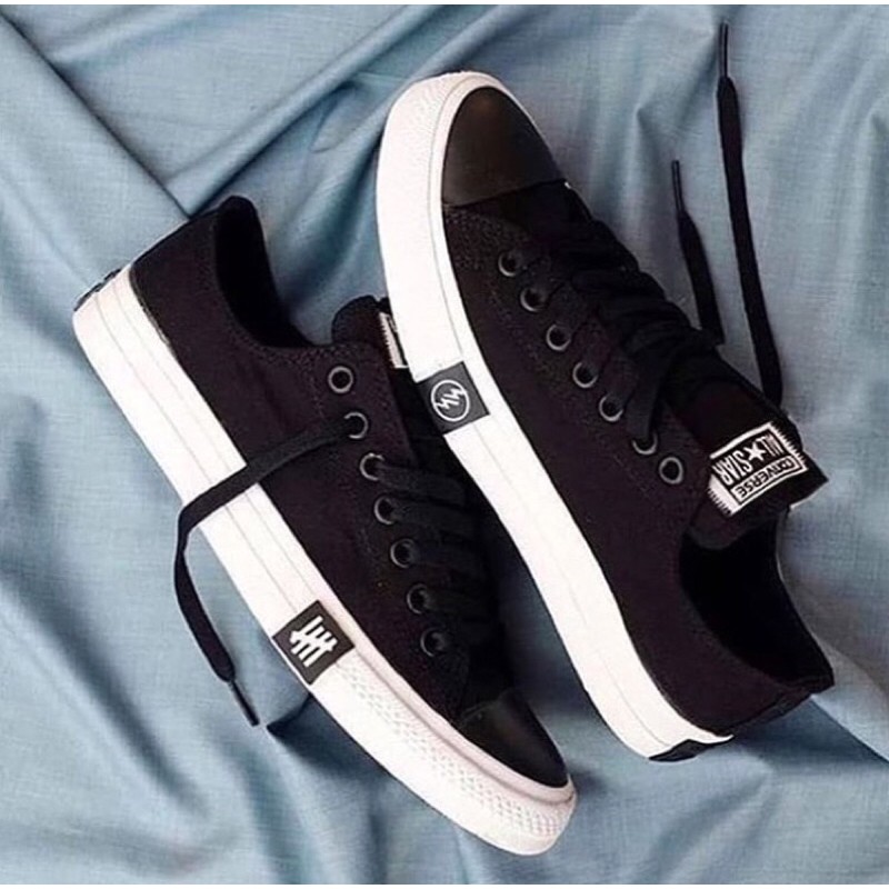 converse x undefeated harga