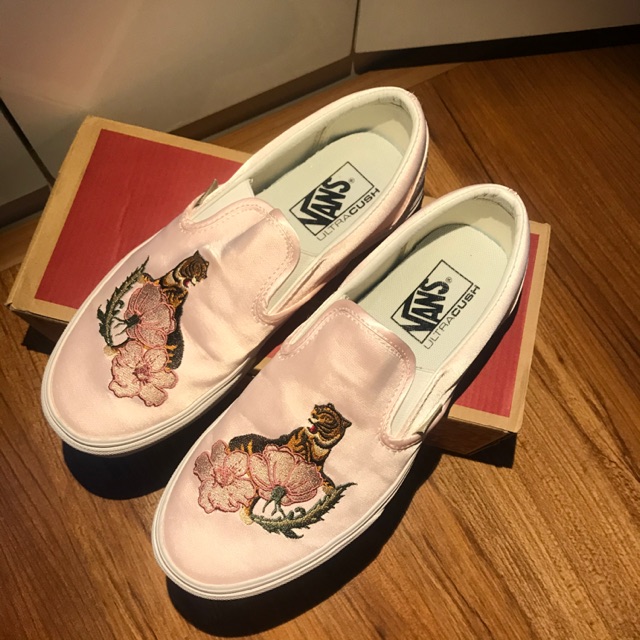 Pink slip on shop vans with tiger