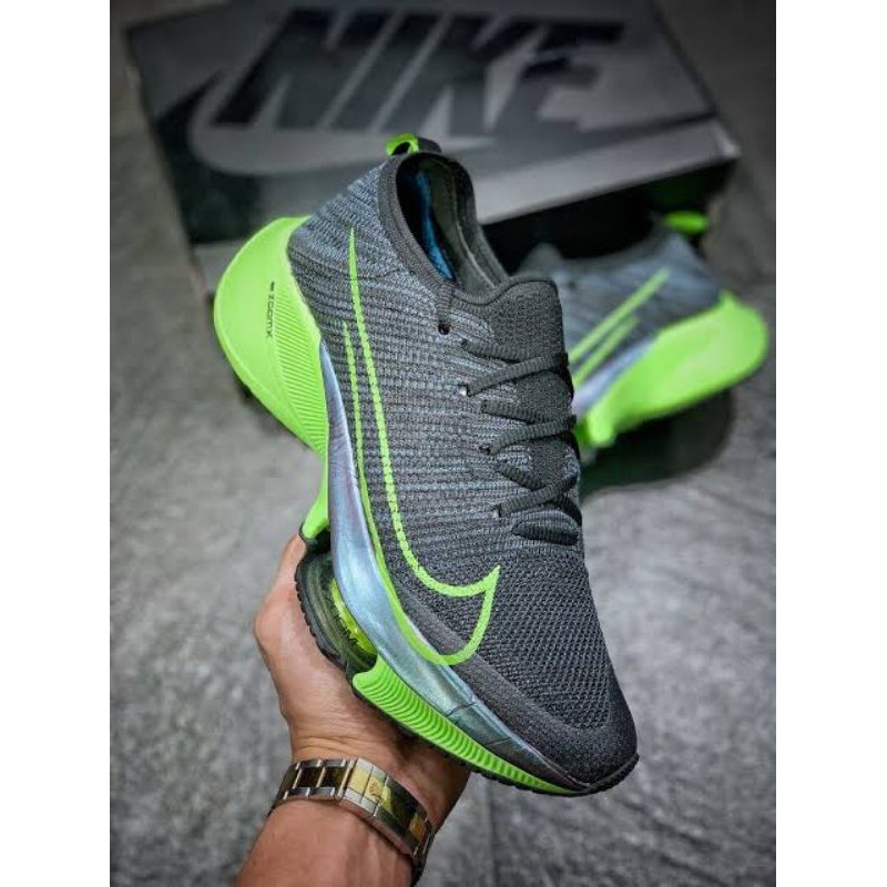 nike tiempo black and green