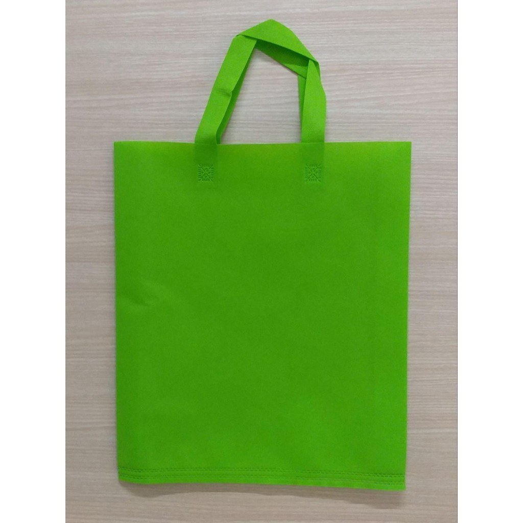 Jual GOODIE BAG SPUNBOND HANDLE 38x45 / Tas Belanja Murah / Kantong