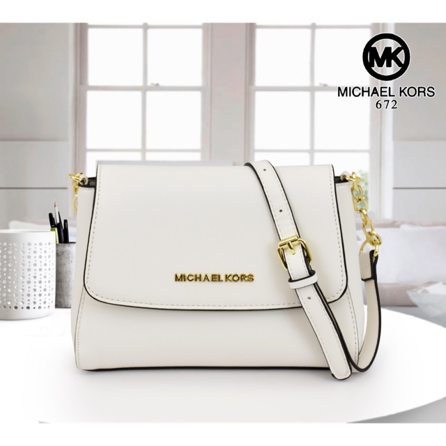 Harga sling best sale bag michael kors