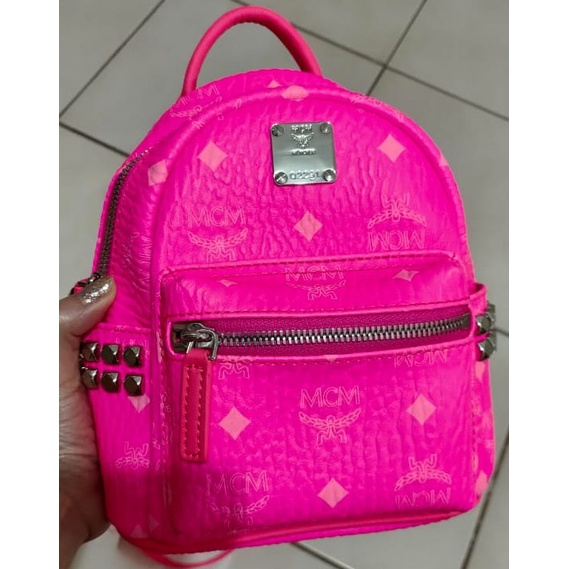 Mcm neon best sale pink backpack