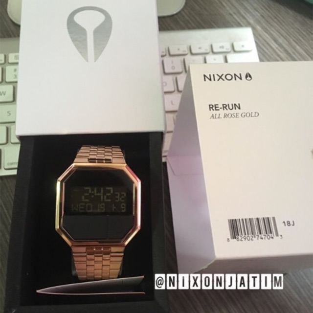 Nixon re cheap run rose gold