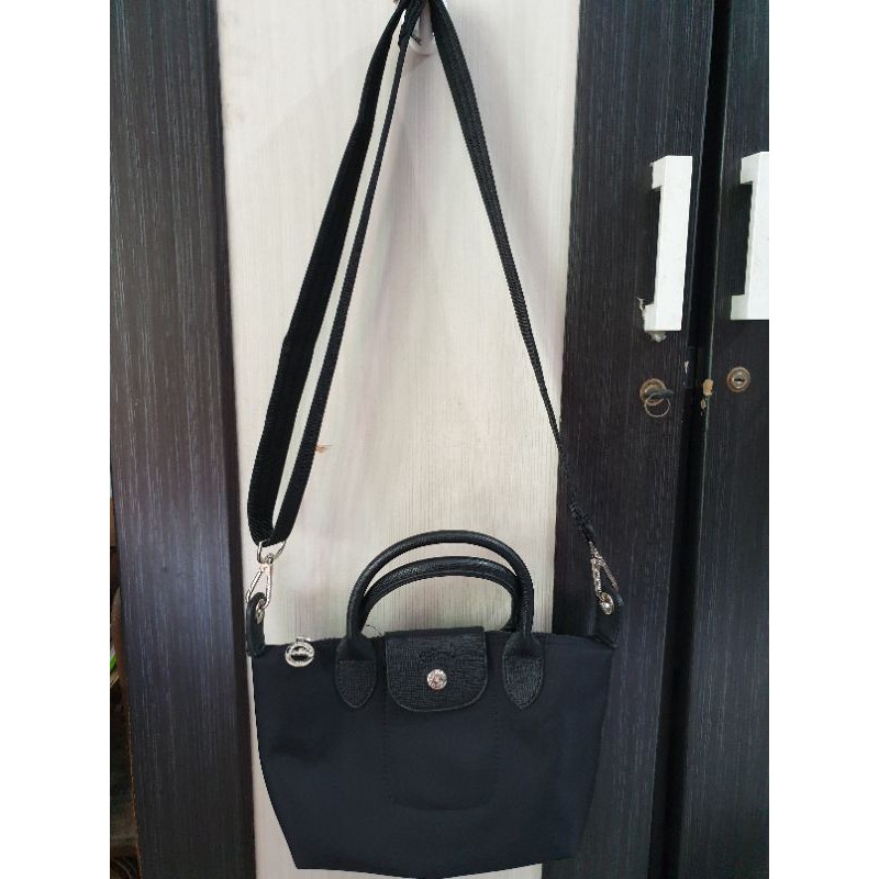 Merk tas longchamp best sale