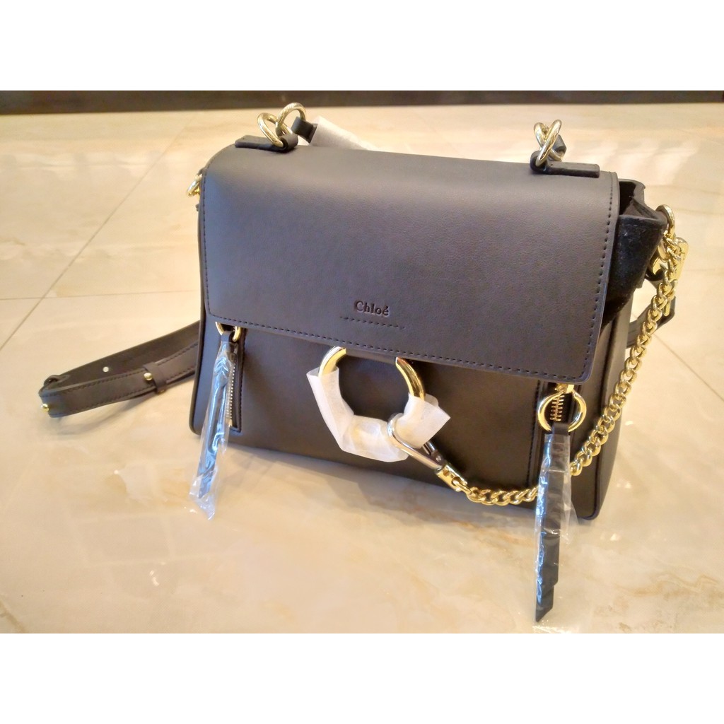 Farfetch chloe faye store