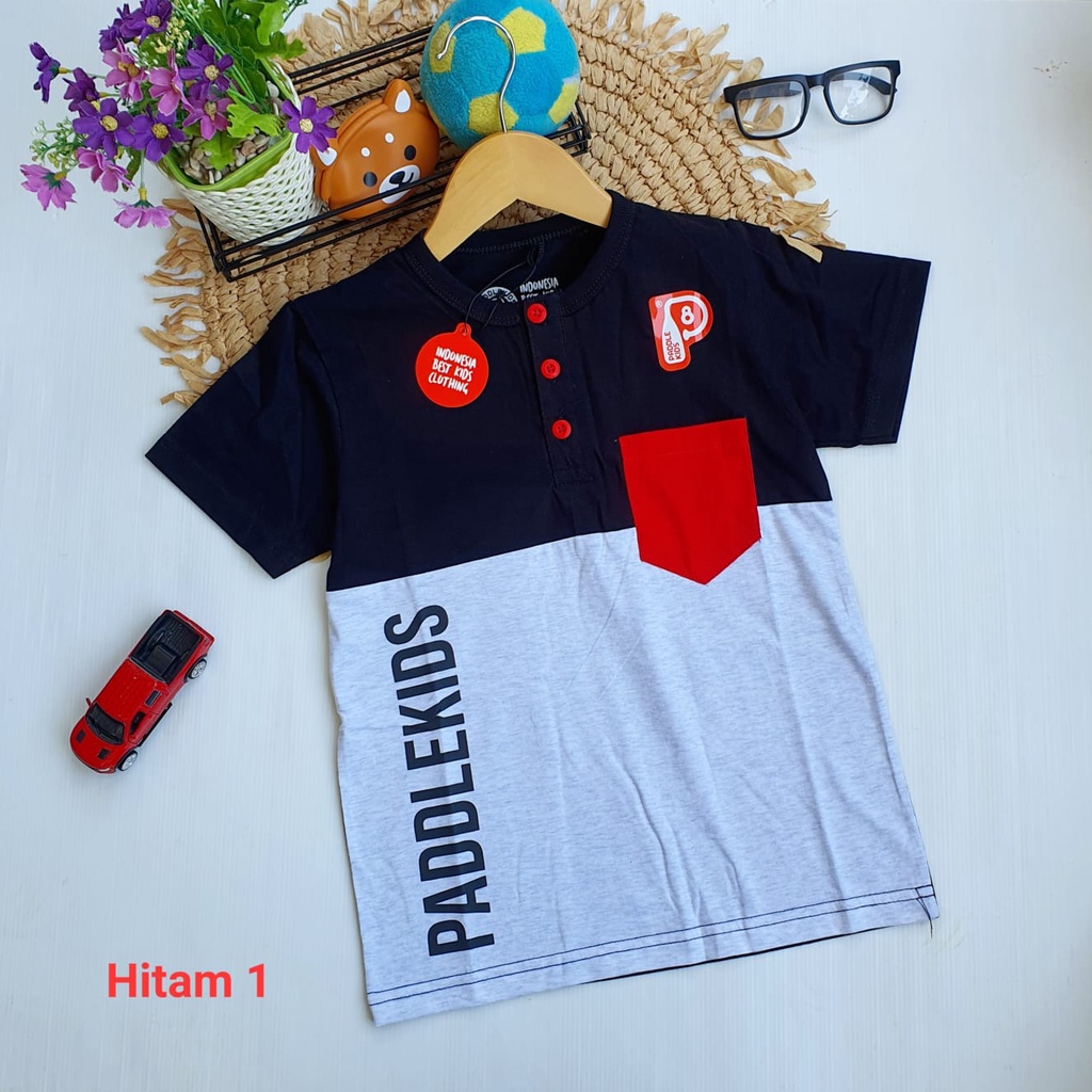 Jual Kaos berkancing dan bersaku Paddle kids Warna Hitam bagian atas ...