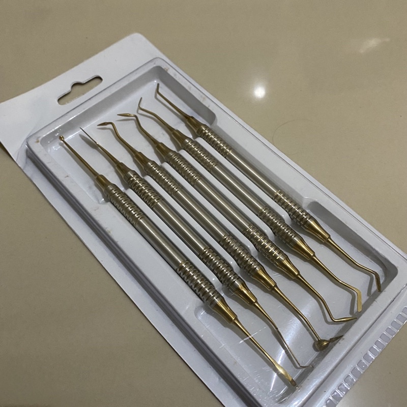 Jual set instrumen filling composite biru/ gold anti lengket | Shopee ...