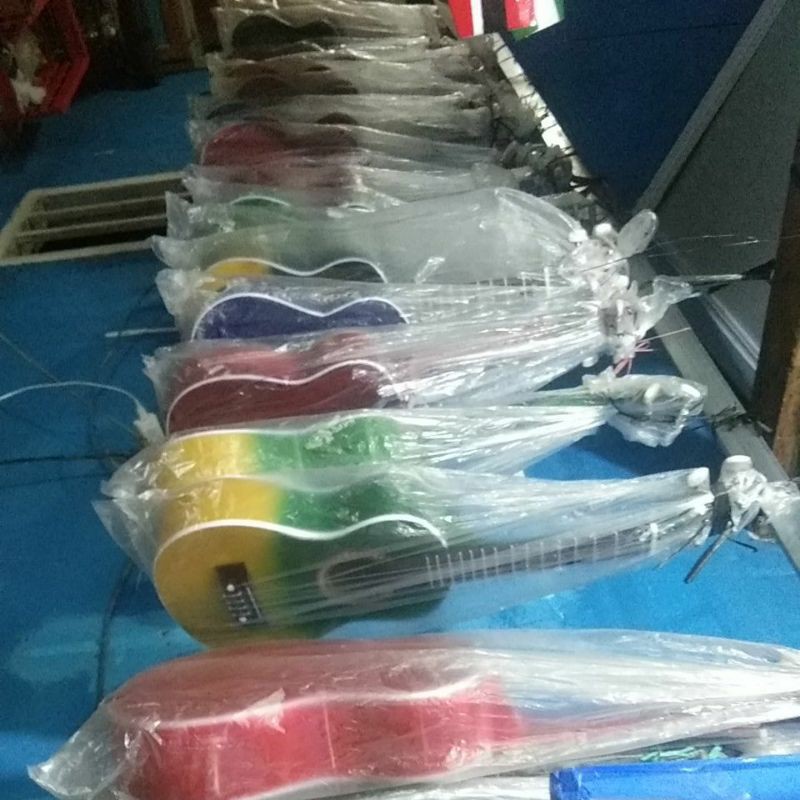 Jual gitar ukulele bahan dari triplek pilihan ready berbagai macam