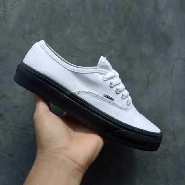Vans authentic white black sole hotsell