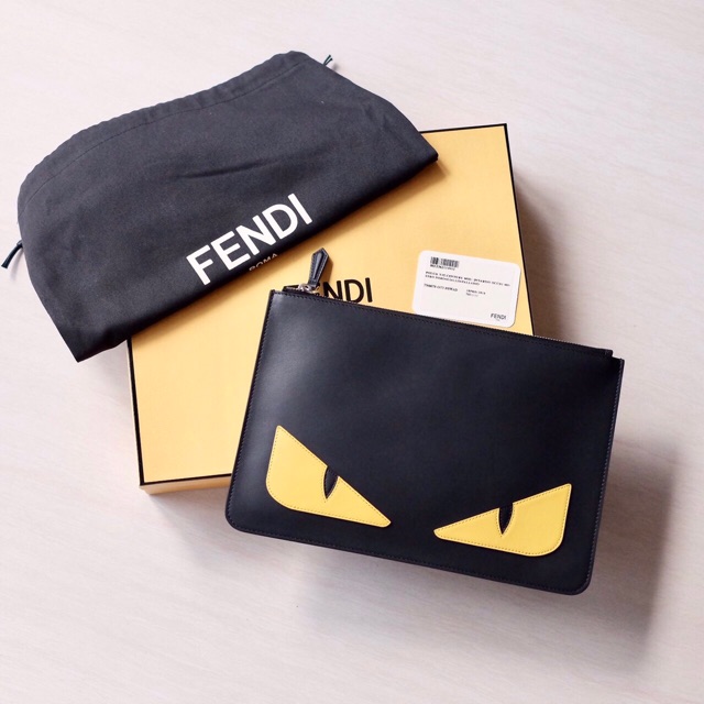 Fendi monster sale clutch bag