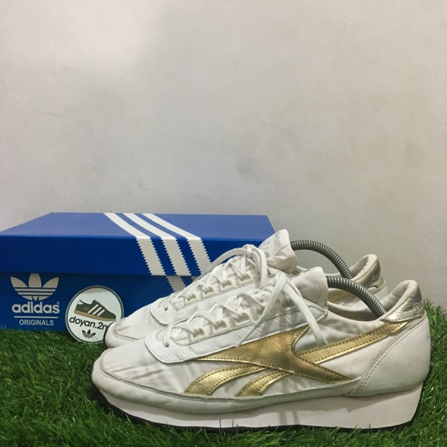 Reebok aztec shop gold